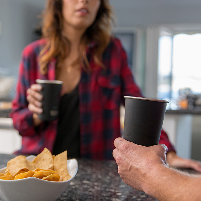 16oz-pint-cup-d7 16ounce_steel_pint_cup_black_party_lifestyle_e7c4b89f-bee2-44df-bb63-bc286febb421.jpg