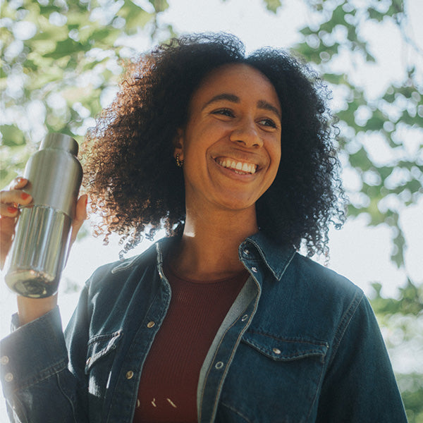bring-your-own-party-kit-tumblers-and-cocktails-r6 16oz_rise_reflect_woman_smile_square.jpg