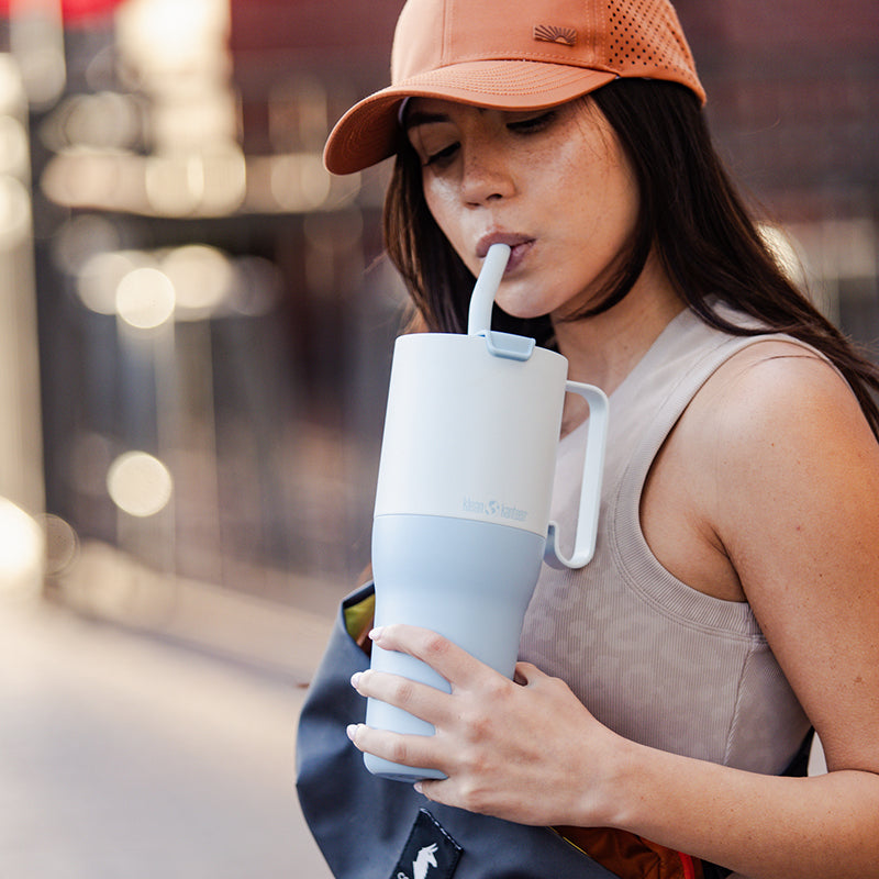 36oz-rise-tumbler-with-straw-lid-q7 36oz_rise_tumbler_straw_girl_sip_square.jpg