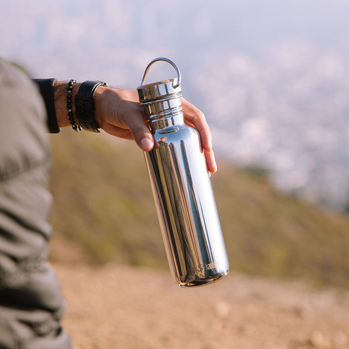 27oz-reflect-with-bamboo-cap-t7 K27SSLRF-MS-BAMBOO_reflect_bottle_hand_lifestyle.jpg