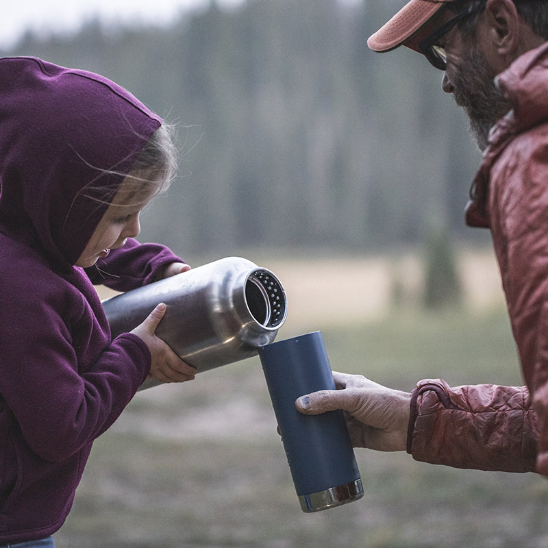 64oz-tkwide-with-loop-cap-r2 tkwide_64oz_bottle_girl_dad_filling_square.jpg